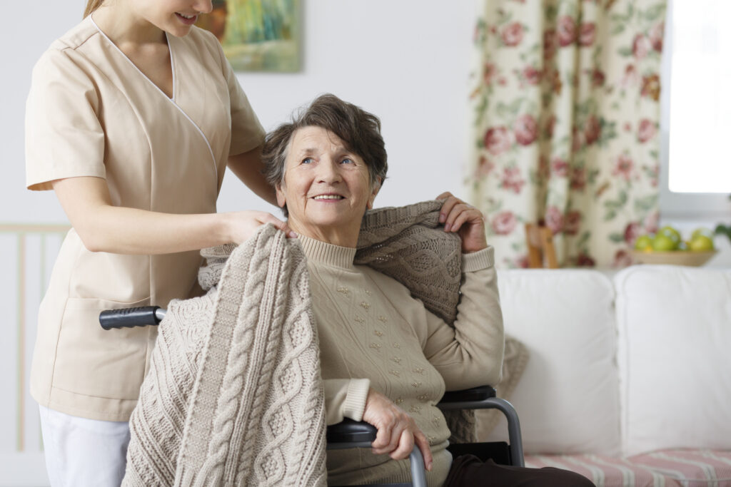 Caregiver Covering Senior Woman With A Blanket 2026 01 05 22 58 51 Utc